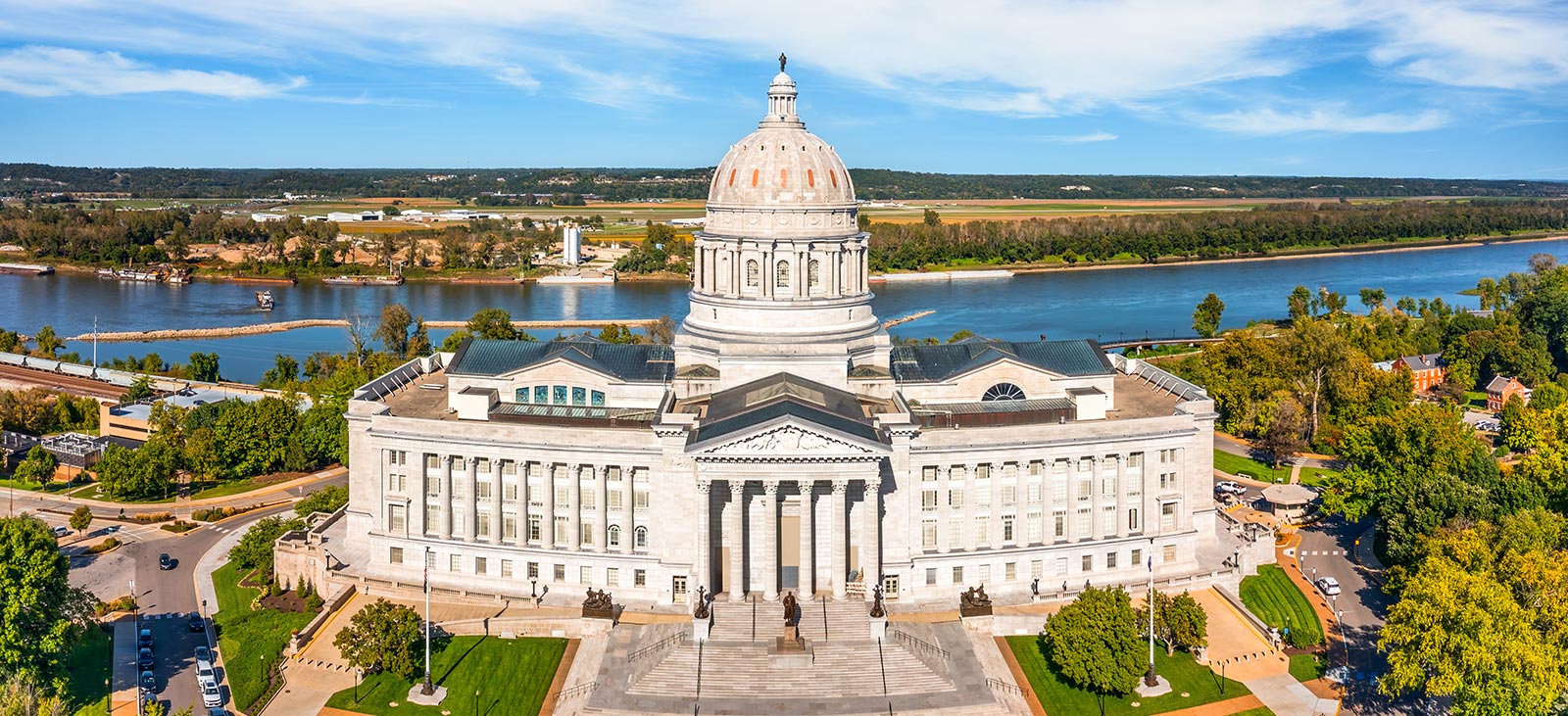 Missouri State Capitol building exterior in Jefferson City with clear blue sky in the background
