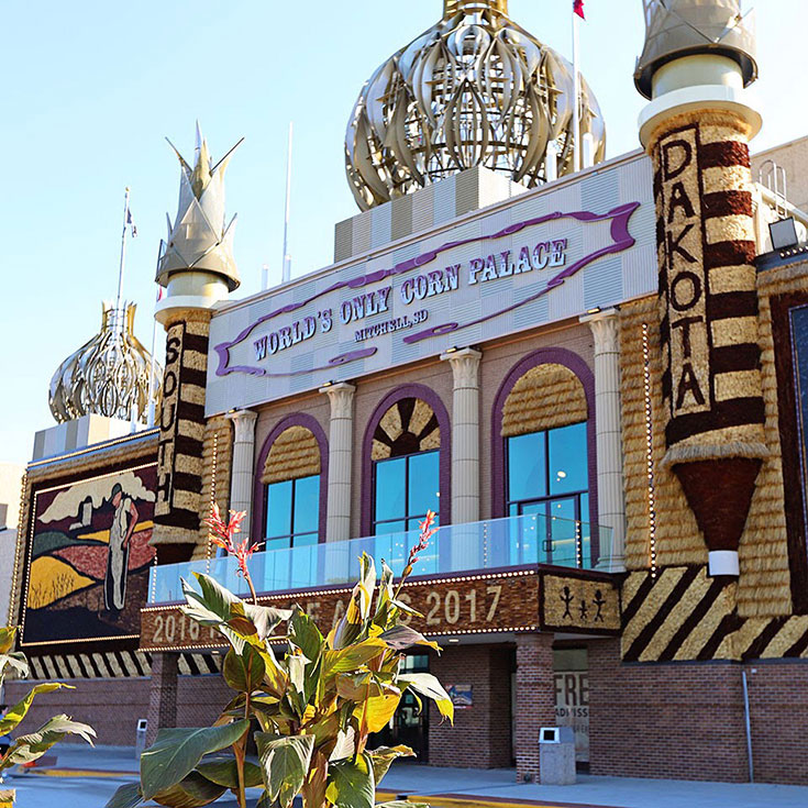 Front view of the World’s Only Corn Palace showcasing hand-crafted corn designs